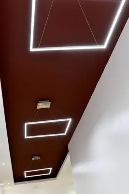 a ceiling with neon lights in a room at 370 General Simón Bolívar in Cordoba