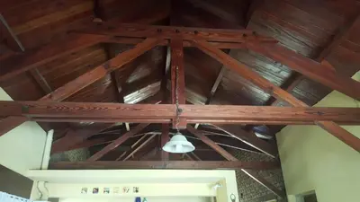 a wooden ceiling with a light hanging from it at Casa en Playa Perelli in Villa Carlos Paz