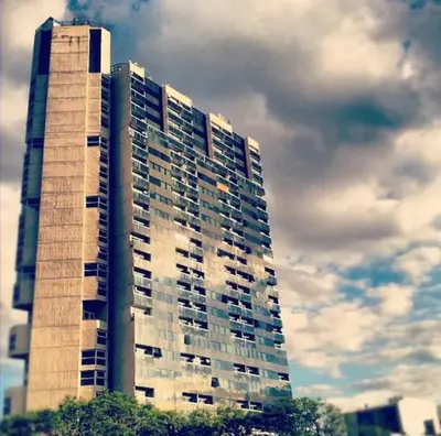 a tall building with many windows on top of it at DEPARTAMENTO SUITE DE LUXE EN EL CENTRO in Cordoba