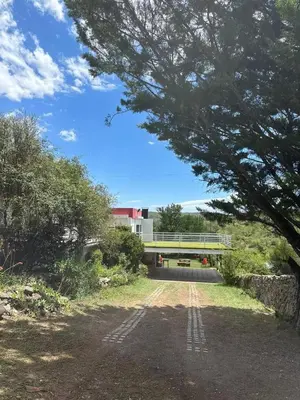 a view of a road with a bridge in the distance at Mi Sueño in San Antonio de Arredondo