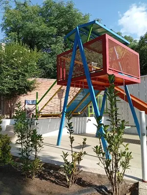 a basketball hoop on top of a playground at Complejo Quiya - Casa El Algarrobo in Alta Gracia