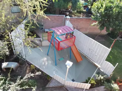 an overhead view of a playground on the roof of a house at Complejo Quiya - Casa El Algarrobo in Alta Gracia