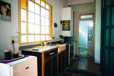 a kitchen with a sink and a window at Santa Rosa in Cordoba