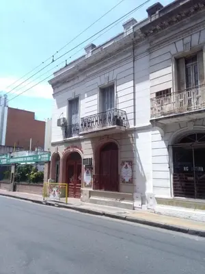 a white building on the side of a street at Santa Rosa in Cordoba