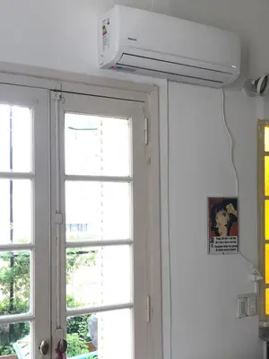 a room with a window and a air conditioner at Santa Rosa in Cordoba