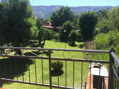 a view of a garden from a balcony at Mi Refugio in Merlo