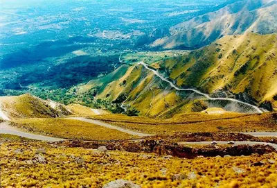 a view of a mountain with a winding road on it at Mi Refugio in Merlo