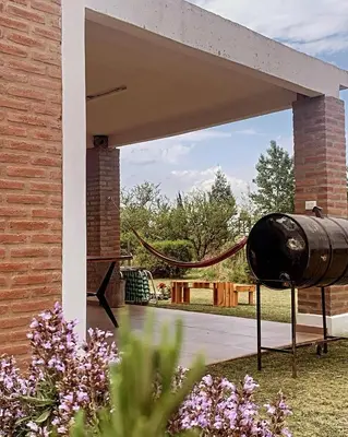 a hose hooked up to a brick building at Cabañas El Descanso in Potrero de Garay