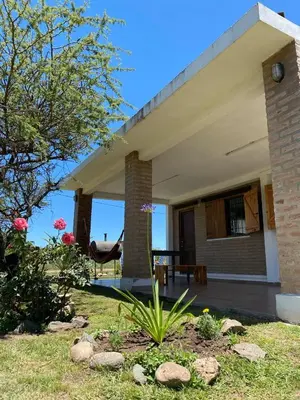 a view of a house with a patio at Cabañas El Descanso in Potrero de Garay