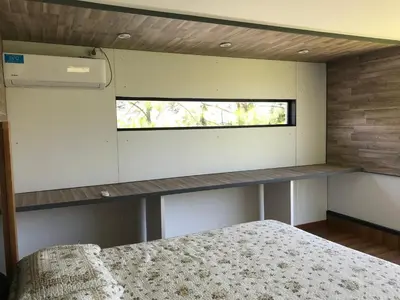 a bedroom with a bed and a window at Gran casa del lago in Villa Ciudad de America