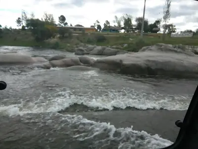 a view of a river from a car window at La Pirca in Nono