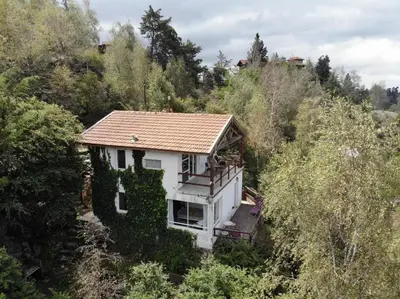an overhead view of a house in the woods at VISTA FRANCA in La Cumbrecita