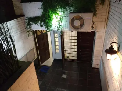 a view from the outside of a house with a door at CERRO CHICO APART in Cordoba