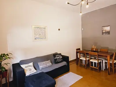 a living room with a couch and a table at LitStay Paso de los Andes PB in Cordoba