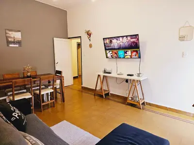 a living room with a couch and a table at LitStay Paso de los Andes PB in Cordoba