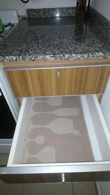 a kitchen counter with a drawer with a counter top at Apartamentos Santa Rosa PB 1 in Cordoba