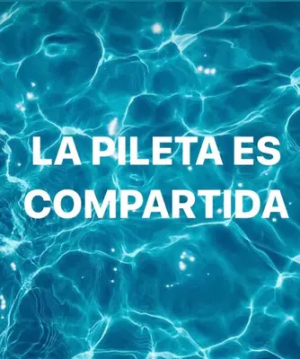a close up of a pool of blue water at Departamento Carlos paz in Villa Carlos Paz