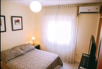 a bedroom with a bed and a window at Tranquilo, comodo y cerca de todo in Cordoba