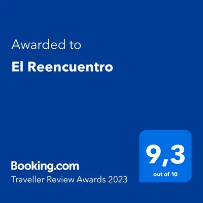 a blue screen with the text awarded to el reichenertino at El Reencuentro in Los Reartes
