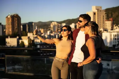 a group of three people standing on top of a city at Los Espinillos Hotel y Spa in Villa Carlos Paz