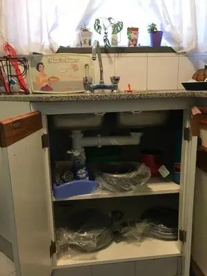 a kitchen cabinet with a sink and a sink at apart Italia in Río Cuarto