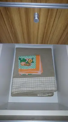 a cake in a box in a drawer at Apartamentos Santa Rosa 2 B T1 in Cordoba
