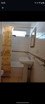 a bathroom with a sink and a tub and a shower at Apartamentos Santa Rosa 2 B T1 in Cordoba