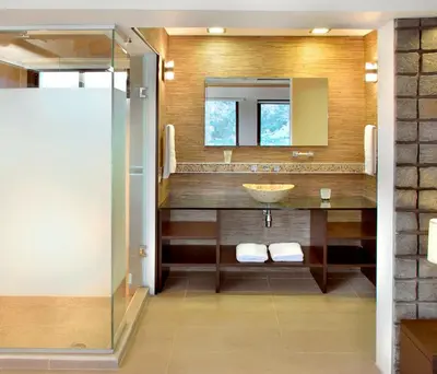 a bathroom with a sink and a mirror at Suites de la Colina in La Cumbrecita