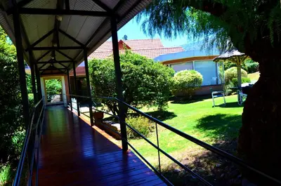 a view of a porch of a house at Paradiso Hotel in Merlo