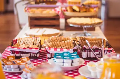 a table topped with lots of different types of food at Solares Hotel & Spa in Alta Gracia