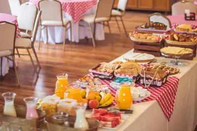a table with a buffet of food and drinks at Solares Hotel & Spa in Alta Gracia
