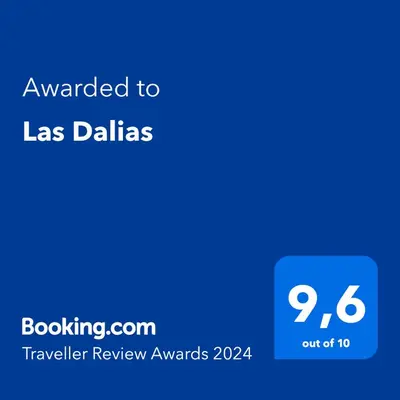 a blue text box with the words awarded to las balls at Las Dalias in Villa de Las Rosas