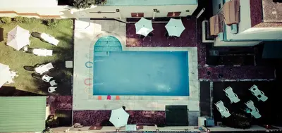 an overhead view of a swimming pool in a city at Casablanca Hotel & Spa in Santa Rosa de Calamuchita