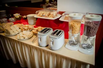 a buffet of food and desserts on a table at Casablanca Hotel & Spa in Santa Rosa de Calamuchita