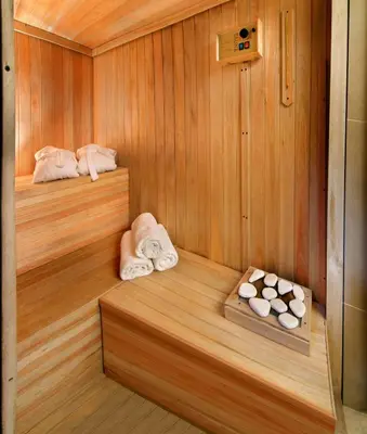 a sauna with towels and a tray of towels at Terrazas de Belgrano - Club de Montaña in Villa General Belgrano