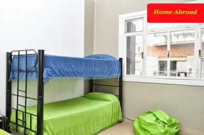a bunk bed in a room with a window at HA! 1 Resi para estudiantes in Cordoba