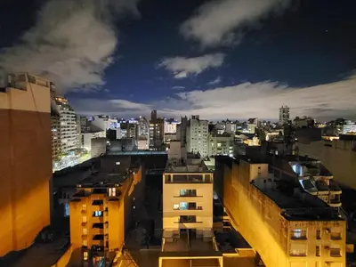 a view of a city at night with buildings at Depa Patio Olmos in Cordoba
