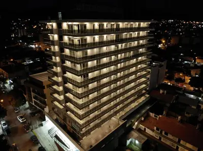an overhead view of a tall building at night at Edificio Leonardo, 5to piso in Villa Carlos Paz