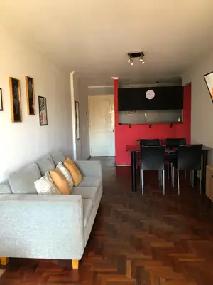 a living room with a couch and a table at 