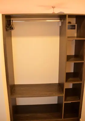 a closet in a hotel room at ARROYO SUITE HOUSE in Mina Clavero
