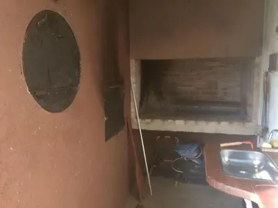a room with a wall with a mirror and a sink at LUMAFACA in La Población