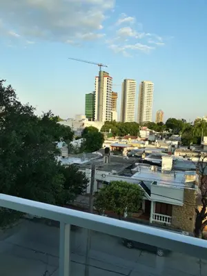 a view of a city from a balcony at CALIDO-Departamento 1 dormitorio amueblado excelente ubicacion in Río Cuarto