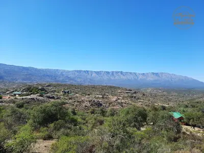 a view of the desert with mountains in the background at Cabaña de Montaña, La Casita Mina Clavero CBA in Mina Clavero