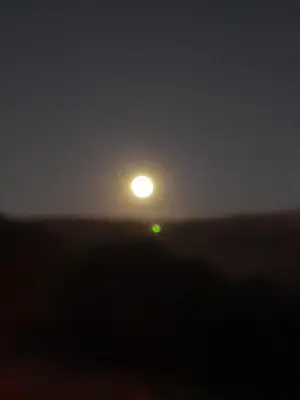 a view of the moon from the ocean at night at Cabaña de Montaña, La Casita Mina Clavero CBA in Mina Clavero