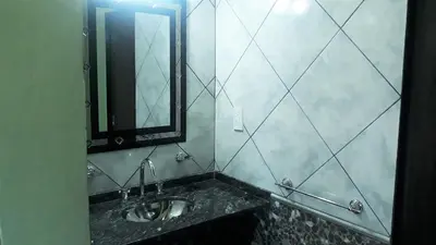 a bathroom with a sink and a mirror at Luz Alba Cabañas in Mina Clavero