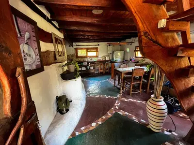 an overhead view of a living room with a slide at el PARAISO in Villa Anizacate