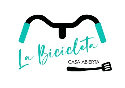 a braided tie with the inscription csa abbera at La Bicicleta solar casa abierta in Villa Independencia