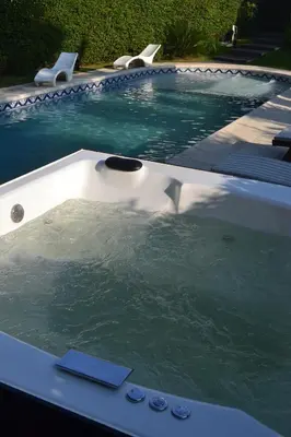 a pool of water with a swimming pool at Casa Simona Villa General Belgrano in Villa General Belgrano