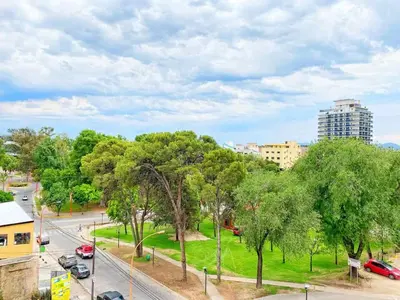a view of a park with trees and a street at Stefano IV in Villa Carlos Paz