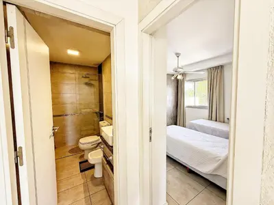 a small bathroom with a toilet and a sink at Stefano IV in Villa Carlos Paz